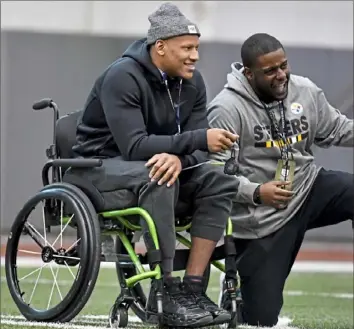  ?? Matt Freed/Post-Gazette ?? Mr. Shazier watches drills during Pro Day on March 21 at the UPMC Rooney Sports Complex on the South Side. He now wears a bracelet that reads “Walking Miracle.”