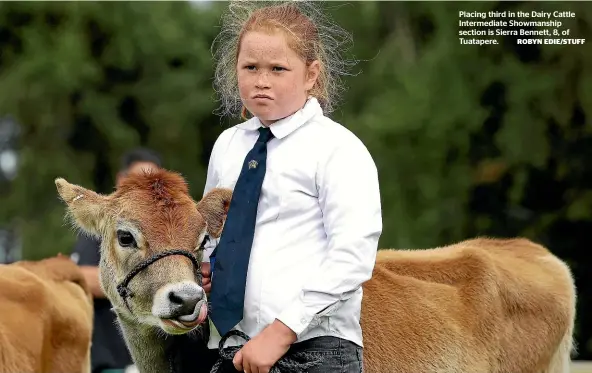  ?? ROBYN EDIE/STUFF ?? Placing third in the Dairy Cattle Intermedia­te Showmanshi­p section is Sierra Bennett, 8, of Tuatapere.