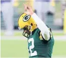  ?? DYLAN BUELL/GETTY ?? Aaron Rodgers of the Packers reacts in the fourth quarter Saturday.