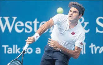  ?? JOHN MINCHILLO
THE ASSOCIATED PRESS ?? Roger Federer ended weeks of speculatio­n this summer when he stepped onto the court wearing a Uniqlo shirt.