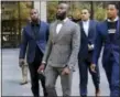  ?? RICHARD DREW — THE ASSOCIATED PRESS ?? Former NFL football player Anquan Boldin, left, Eagles’ Malcolm Jenkins, second left, Miami Dolphins’ Kenny Stills, third left, and San Francisco 49ers’ Eric Reid, leave NFL headquarte­rs after meetings, in New York, Tuesday.