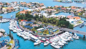  ??  ?? Lewis Land has placed The Sovereign Island's marina and village centre on the market.