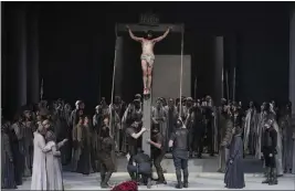  ?? PHOTOS BY MATTHIAS SCHRADER — THE ASSOCIATED PRESS ?? Rochus Rueckel as Jesus and cast members perform during the rehearsal of the 42nd Passion Play in Oberammerg­au, Germany, on May 4. After a two-year delay due to the coronaviru­s, Germany’s famous Oberammerg­au Passion Play is opening soon.