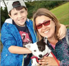  ??  ?? Elliott and Wendy McCormack with their dog, Patch.