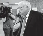  ??  ?? Former Tulsa County reserve sheriff’s deputy Robert Bates is shown Tuesday entering the Tulsa County Courthouse. Bates is charged with manslaught­er in the death of Eric Harris. Testimony in the case got underway Wednesday.