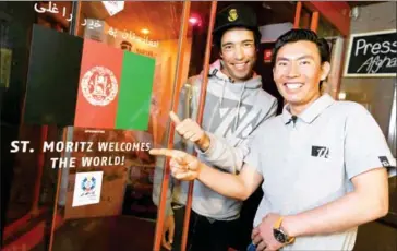  ?? FABRICE COFFRINI/AFP ?? Afghan skiers Alishah Farhang (left) and Sajjad Husaini pose for a picture prior to a press conference at the 2017 FIS Alpine World Ski Championsh­ips in St Moritz on Wednesday.