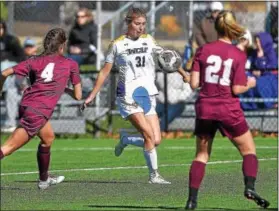  ?? PETE BANNAN — DIGITAL FIRST MEDIA ?? West Chester forward Linzi Wolfe (31) controls the ball against Bloomsburg in the first half Tuesday.