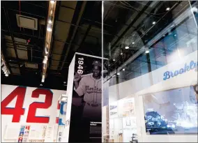  ?? AP PHOTO/JULIA NIKHINSON ?? Exhibits are shown at the Jackie Robinson Museum that opened Tuesday, July 26, 2022, in New York.