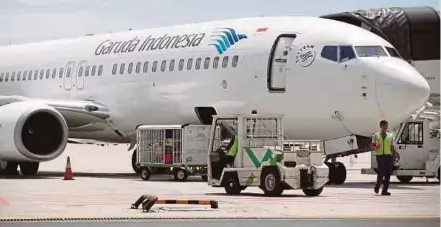  ?? REUTERS PIC ?? Indonesia’s national flag carrier Garuda is accused of misreprese­nting a US$240 million financial transactio­n in its 2018 results, a claim it has rejected.