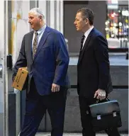  ?? AP ?? Former Ohio House Speaker Larry Householde­r walks into Potter Stewart U.S. Courthouse with his attorneys in Cincinnati. Householde­r and former Ohio Republican Party chair Matt Borges are charged with racketeeri­ng in an alleged $60 million scheme to pass legislatio­n to secure a $1 billion bailout for two nuclear power plants.