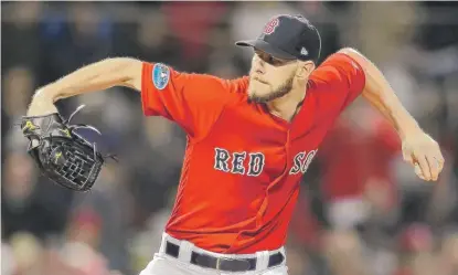  ?? ELSA/GETTY IMAGES ?? Ex-White Sox ace Chris Sale held the Yankees scoreless until the sixth inning Friday en route to his first playoff win.