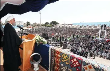  ?? IRANIAN PRESIDENCY/AFP ?? President Hassan Rouhani addresses crowds during a rally in the northweste­rn city of Sabzevar on Sunday.