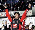  ?? Associated Press ?? Kurt Busch celebrates in Victory Lane after winning the Daytona 500 on Sunday at Daytona Internatio­nal Speedway in Daytona Beach, Fla.