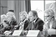  ?? AP/EFREM LUKATSKY ?? The leader of an election-observatio­n mission in Ukraine, Walburga Habsburg Douglas (center), talks to the media during a news conference in Kiev, Ukraine, on Monday.