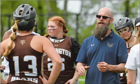  ?? DANA JENSEN/THE DAY ?? Stonington High School girls’ lacrosse coach, Jeff Medeiros, right, during a game last season, has been diagnosed with Stage 4 anal cancer but continues to lead the program he has been with for 22 seasons. The Bears, 17-3 last year, are the defending Eastern Connecticu­t Conference Division II champions.