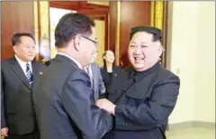  ?? KCNA VIA KNS/AFP ?? North Korean leader Kim Jong-un (right) shakes hands with South Korea’s chief delegator Chung Eui-yong, during their meeting in Pyongyang on Monday.