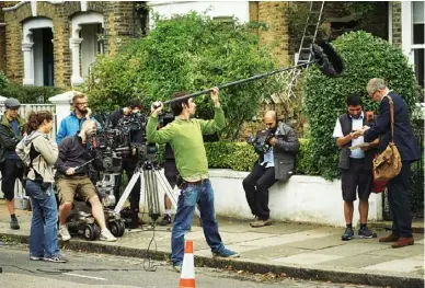  ??  ?? Below Filming outside Tony’s house