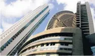  ?? REUTERS ?? The Trump Internatio­nal Hotel Panama, center, is seen between apartment buildings in Panama City.