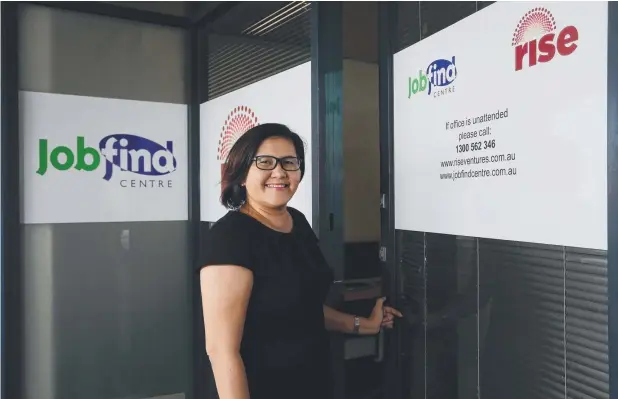  ?? Picture: STEWART McLEAN ?? HELPING OUT: Disability Employment Services consultant Florence Walker at the Spence St entrance to the new offices.