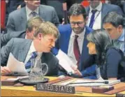  ?? AFP ?? ▪ British deputy ambassador to the UN Jonathan Allen (left) speaks to US envoy to the UN Nikki Haley (right).