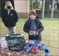  ??  ?? DETERMINED Albie Leahy, nine, has been serving up hot meals