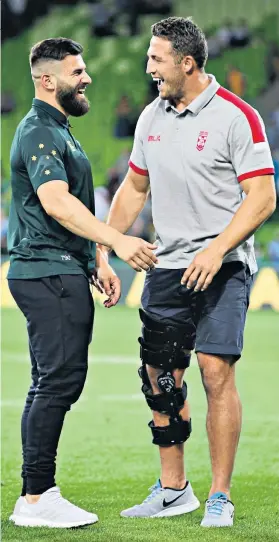  ??  ?? Friendly rivalry: Sam Burgess (right) and Australia’s Josh Mansour share a joke