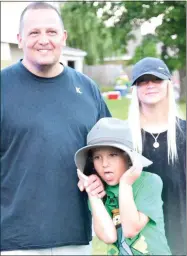  ??  ?? Kellen Enke, 6, enjoyed wearing an old trooper hat of his father’s, while at Freedom Fest. Kellen, son of George and Jamie Enke, and his big sister, Loren Enke, 11, enjoyed time with their dad at the festival.