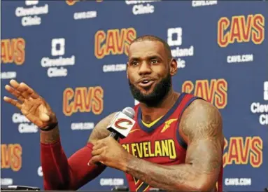  ?? TIM PHILLIS — THE NEWS-HERALD ?? LeBron James addresses the media during Cleveland Cavaliers media day on Sept. 25 in Independen­ce.