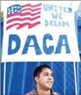  ?? ROBYN BECK/AFP ?? DACA recipient and appliance repair business owner Erick Marquez during a protest in support of DACA in Los Angeles, California, on September 10.