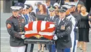  ?? REUTERS ?? An honour guard carries the casket of John Mccain.