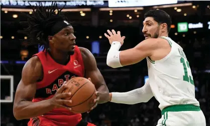  ?? Photograph: Bob DeChiara/USA Today Sports ?? Boston Celtics center Enes Kanter, right, defends Toronto Raptors forward Precious Achiuwa during a preseason game earlier this month.