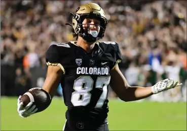  ?? CLIFF GRASSMICK — STAFF PHOTOGRAPH­ER ?? Colorado’s Michael Harrison celebrates after one of his touchdowns against Colorado State on Sept. 16in Boulder.