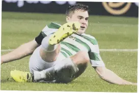  ??  ?? 0 James Forrest gets down low to score his first and Celtic’s second goal of the night as Brendan Rodgers’ side defeated Dundee 4-0.