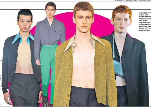  ?? ?? Oversized shirt collars and dashes of colour punctuated the otherwise stripped-back suits in Prada’s Menswear Fallwinter 2023-24 show in Milan