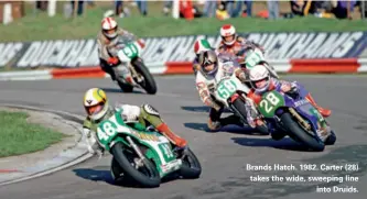  ??  ?? Brands Hatch. 1982. Carter (28) takes the wide, sweeping line into Druids.