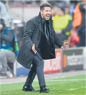  ??  ?? Atletico Madrid coach Diego Simeone during the match against Leverkusen.
