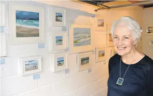  ?? 50_c35anceard­ach01 ?? Christine Russell with her gallery of sea and landscape paintings at An Ceardach.