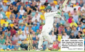  ?? Picture: GETTY IMAGES ?? BIG SHOT: Australian rookie Peter Handscomb during day one of the first test against Pakistan at Brisbane’s Gabba yesterday