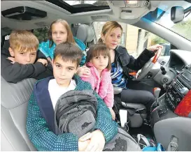  ?? DARREN MAKOWICHUK ?? Sarah Bieber’s children, from left, Kai, 10, Halle, 8, Jayce, 11, and Cora, 6, go to three different schools. She is wondering how she will cope with the changes in bus routes and start times when they come into effect in September.