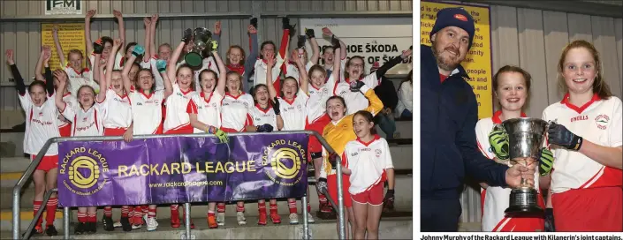  ??  ?? The all-conquering Kilanerin girls with the spoils of success. Johnny Murphy of the Rackard League with Kilanerin’s joint captains, Ella Jones and Róisín McGonigle.