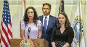  ?? DAMON HIGGINS / PALM BEACH POST VIA AP ?? Fla. Gov. Ron Desantis (center) and Jeffrey Epstein victims Hayley Robson (left) and Jena-lisa Jones answer questions at the Palm Beach Police Department in Palm Beach, Fla., Thursday.