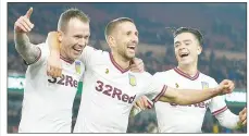  ??  ?? FINAL NAIL: Villa celebrate Glenn Whelan’s goal at Boro