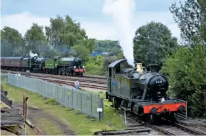  ?? ADRIAN COPLEY ?? Standing at the DFR’s main line connection at Lydney Junction, No. 5541 whistles a greeting to a Steam Dreams Rail Co. charter from Paddington to Cardiff via Gloucester on August 1 2019. The tour stopped at Lydney for some passengers to alight and visit the DFR, which has also hosted incoming main line diesel charters (with the preserved ‘Hastings’ DEMU) and a First Great Western Class 150 unit from Gloucester.