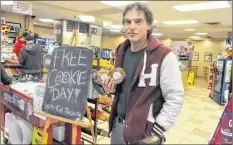  ?? Sara ericssoN ?? Jonathan Hiltz visits the store almost daily. His favourite: a classic chocolate chip cookie.