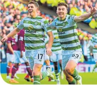  ??  ?? Ryan Christie celebrates with Kieran Tierney after scoring against Hearts last October