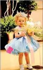  ??  ?? Raeleigh Brown, 23 months, of Seligman, Mo., was crowned Baby Miss Clothespin in the youngest division for the Miss Clothespin Pageant, held Sunday in Prairie Grove. This division was for girls 0-24 months old. Bailey Mitchell was named Princess and...