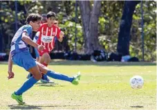  ?? Photo: Kevin Farmer ?? ON TARGET: Jaydahn Hearn scores the game winning goal for South West Queensland Thunder in the semi-final against Olympic FC.