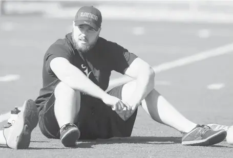  ?? JEAN LEVAC/OTTAWA CITIZEN ?? Six-four, 300-pound Matt Lapointe and the new Carleton Ravens football team took to the field this week, 15 years after the school dropped the sport.