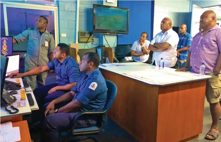  ?? Photo: Fiji Maritime Search and Rescue Co-ordination Centre ?? Prime Minister Voreqe Bainimaram­a observes operations at the Fiji Maritime Search and Rescue Co-ordination Centre on December 28, 2018 at the Stanley Brown Navy Base, Walu Bay.