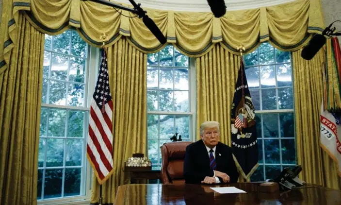  ?? Photograph: Evan Vucci/AP ?? Donald Trump in August 2018. Trump’s daily diary shows an entry at 11.17am; the next entry is not until 6.54pm.
